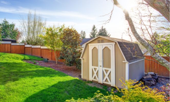 tan shed in backyard