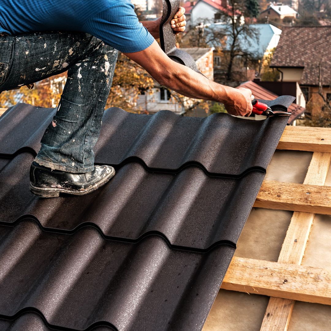 man repairing a roof